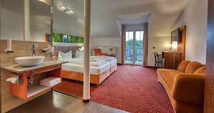 Klassisches Zimmer im Obergeschoss Classic-Zimmer im Obergeschoss